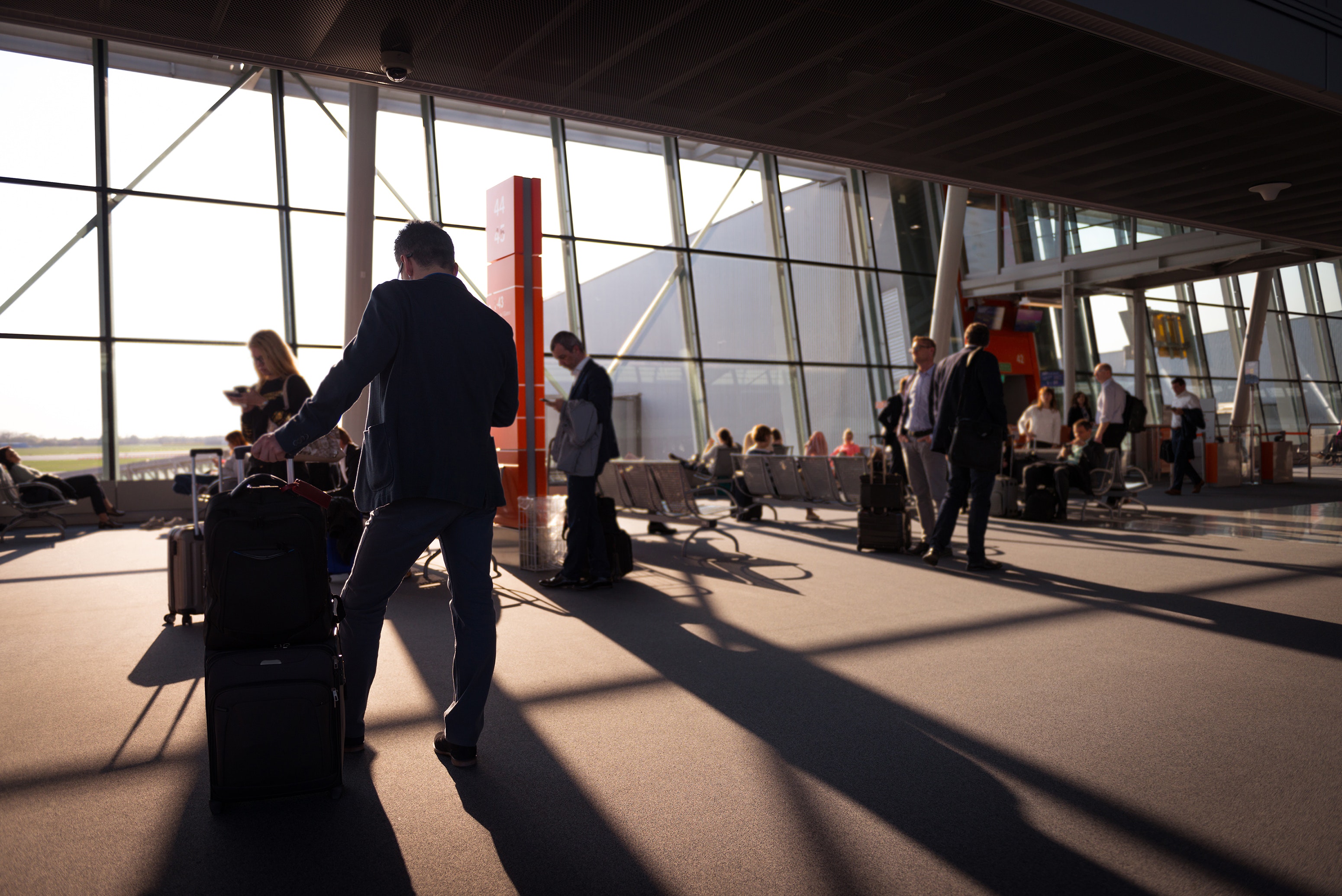 People waiting in airport terminal