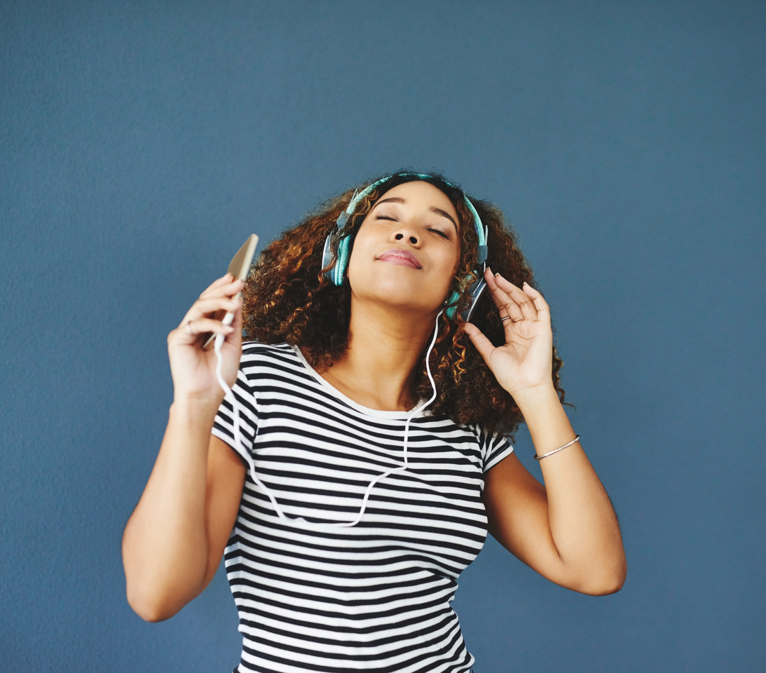 Lady with headphone listening to music