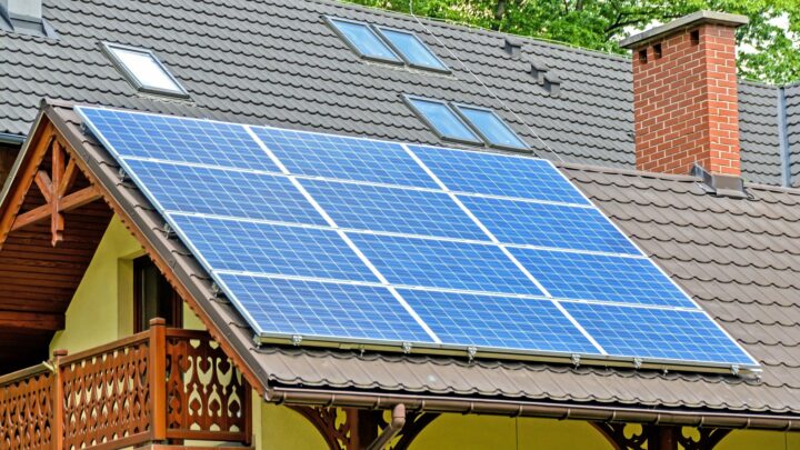 solar panels on yellow house