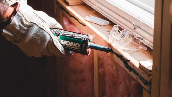 Worker repairing window