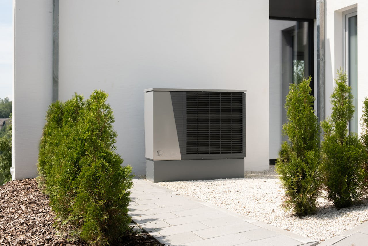 Heat pump on white wall