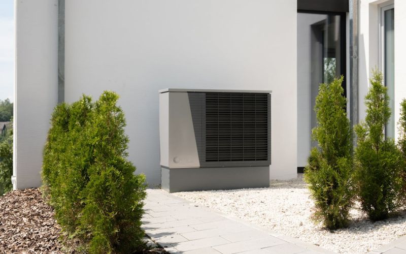 Heat pump on white wall