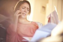 Woman checking her energy bill