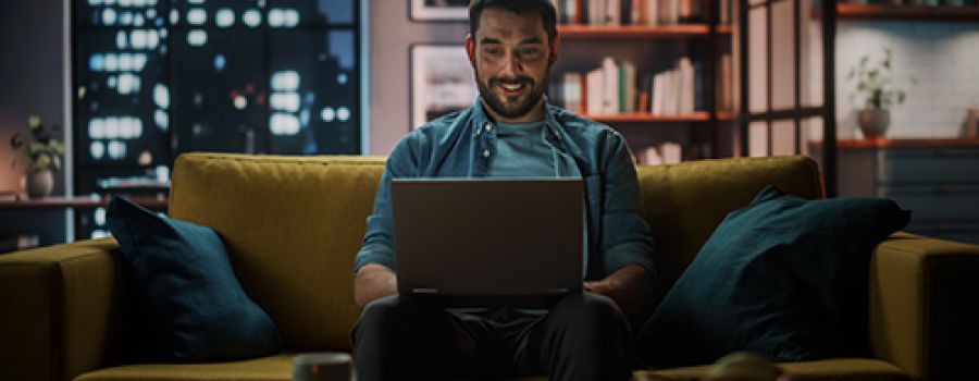 Person looking at screen in his flat