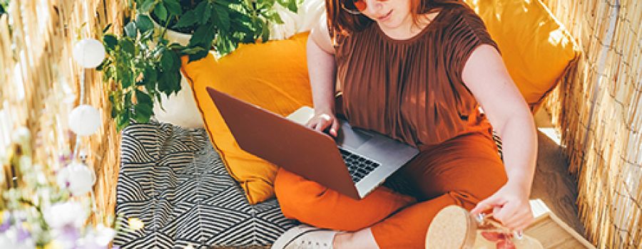 Lady checking her emails abroad