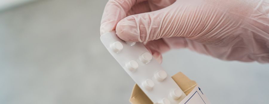 Person Holding White and Blue Medicine Tablet, Photo by Castorly Stock