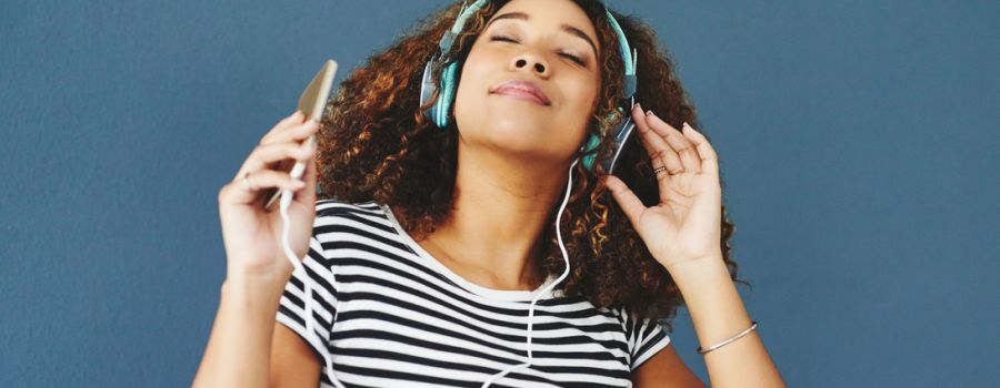 Lady with headphone listening to music