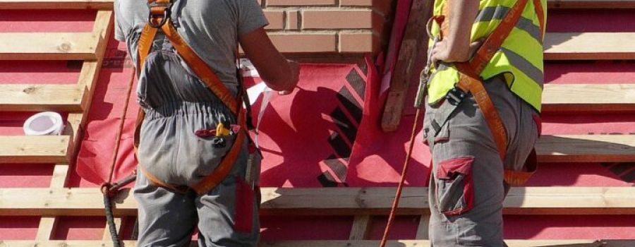 workers renovating a roof