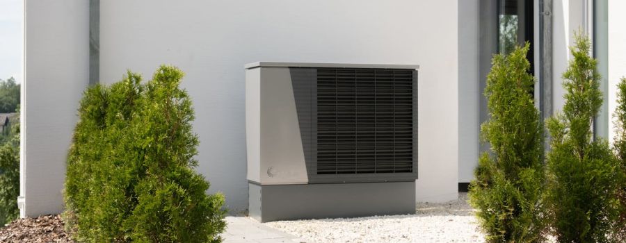 Heat pump on white wall